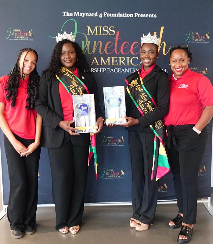 Miss Juneteenth America representatives holding Opal Lee dolls during the Jenna & Sheinelle feature experience in Mobile.