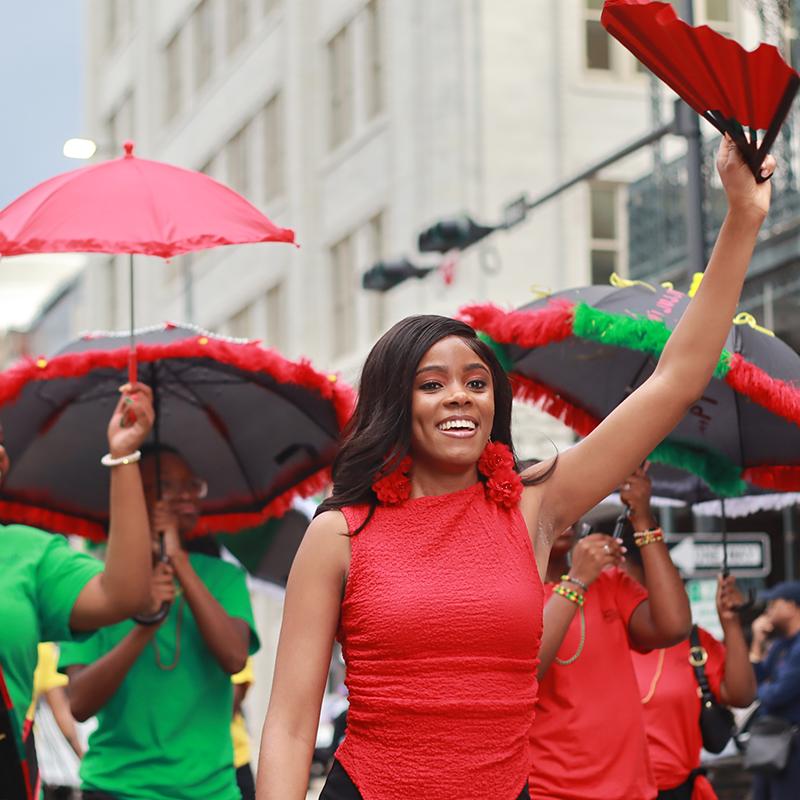 Simone Sharod participating in the Miss Juneteenth America Second Line Parade in Mobile, Alabama.