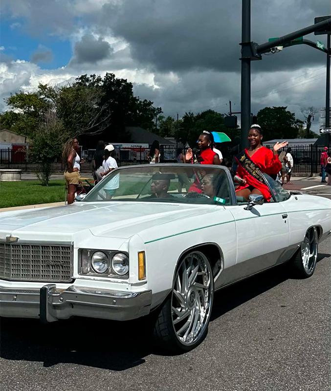 Miss Juneteenth America representatives riding in the 2026 Port City Classic motorcade in Mobile, Alabama.