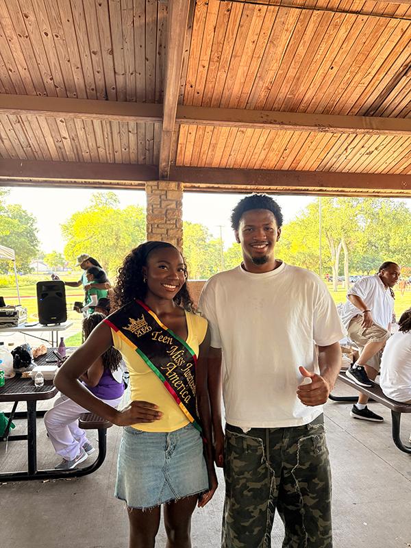 Queen Tammy Maku connecting with a community member at the Junior Ezeonu Back-to-School Bash.