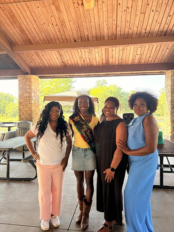 Queen Tammy Maku with community leaders during the Junior Ezeonu Back-to-School Bash.