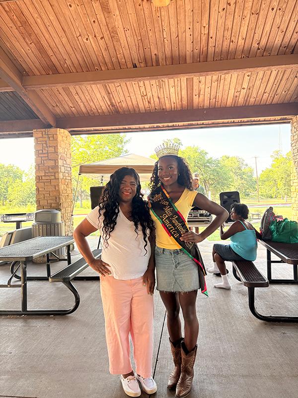 Queen Tammy Maku with a community supporter during the Junior Ezeonu Back-to-School Bash.